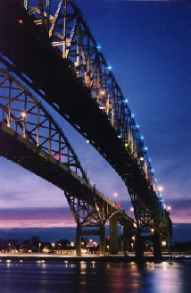 The Blue Water Bridges linking Port Huron, MI with Sarnia, ON at the point where Lake Huron becomes the St. Clair River.