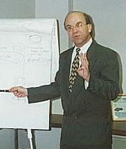 Joe Grasmick showing a client the three ways to obtain B-1 status.